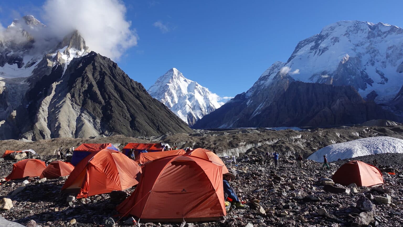 K2 Base Camp tents below Karakoram mountains in Pakistan